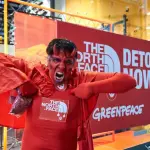Greenpeace a Milano, coriandoli rossi contro The North Face